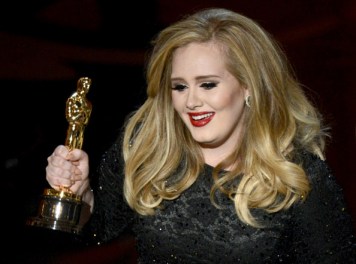 Adele celebrating Oscar for song Skyfall. photo credit: zimbio.com