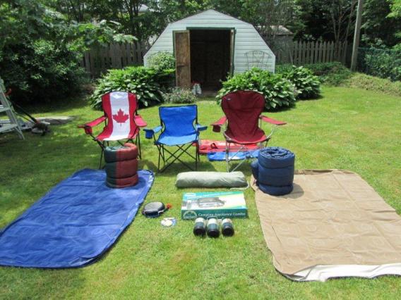 Camping gear - includes a tent in a bag, and a propane stove, but no cookware! Last camping: 2008