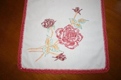 This is a runner - you put it on your dresser to help display your silver vanity set better!