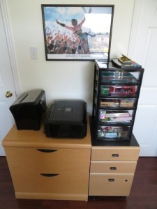 Filing cabinets, stationery drawers, poster of Amanda Palmer