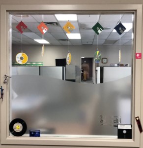 Interior window decorated with old media