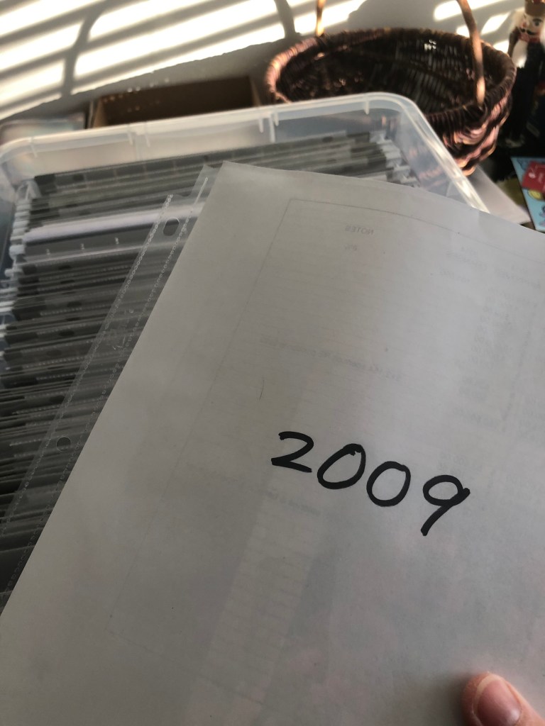 Plastic pocket with title page insert reading 2009